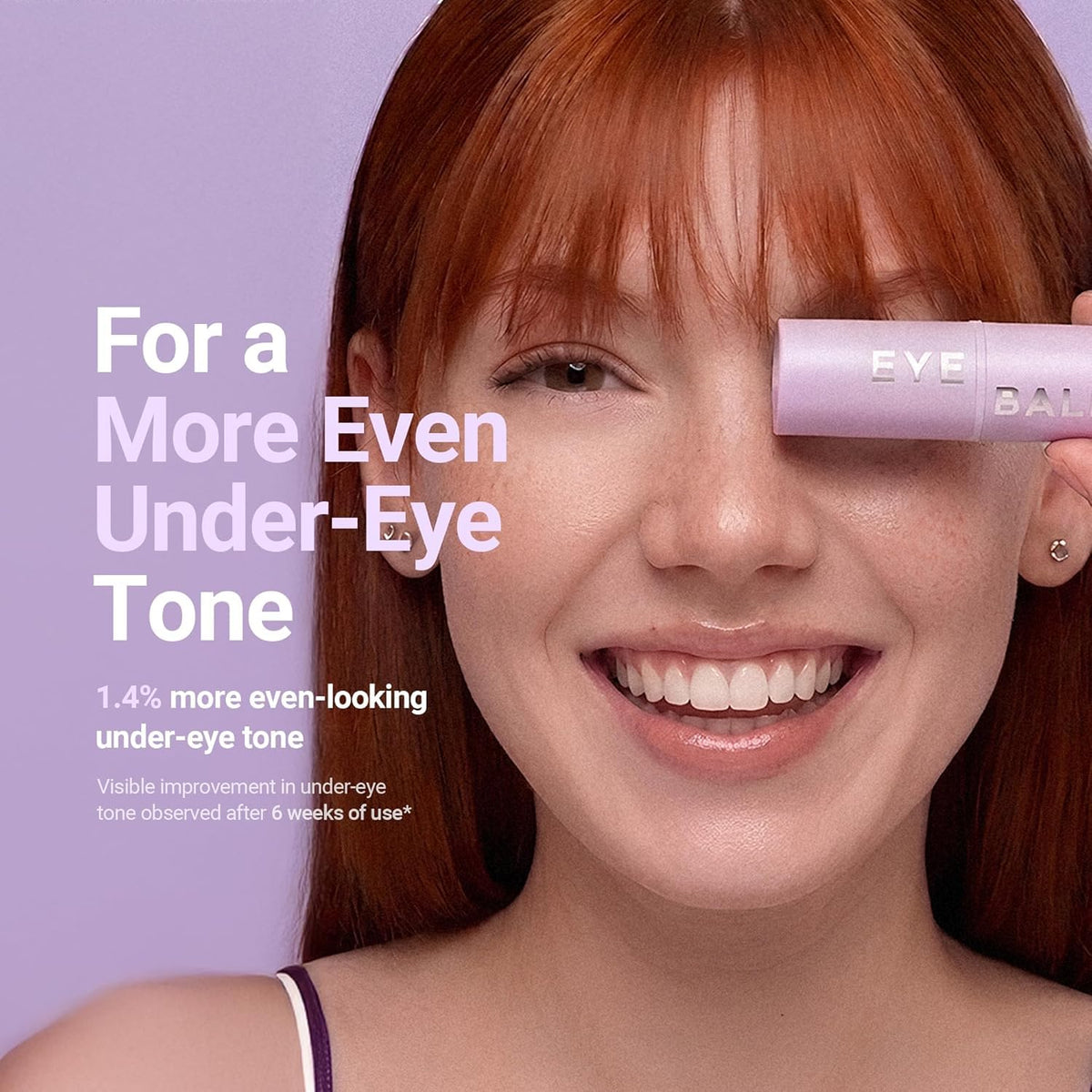Woman holding the KAHI Eye Balm: for a more even-looking under-eye tone