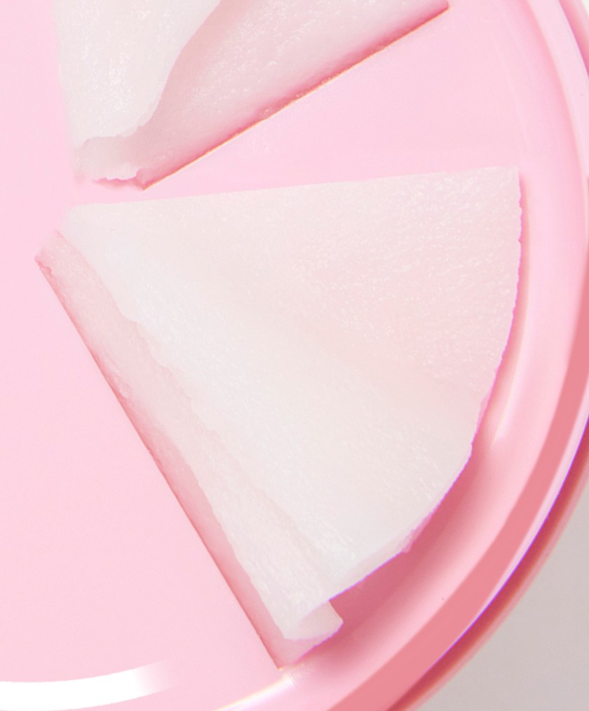 Shaved curls of KAHI Cleansing Balm Sensitive Care (Camellia) in the twist-up jar