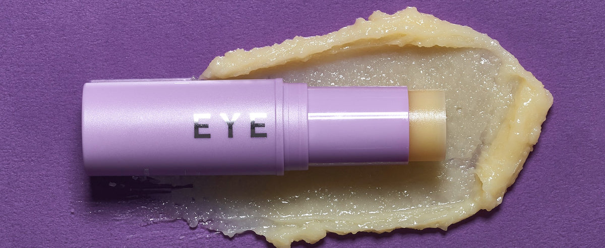 KAHI Eye Balm stick on a swatch of its balm texture